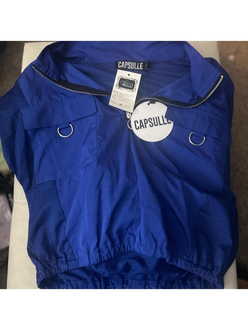 Capsulle blue mesh panel track suit set New with tags. Size: L